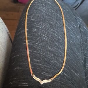 Gold Necklace with Diamond Detailing